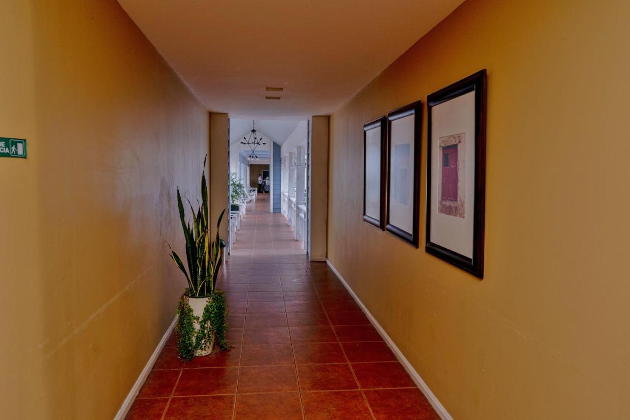 Hotel Casona Del Lago Flores Bagian luar foto